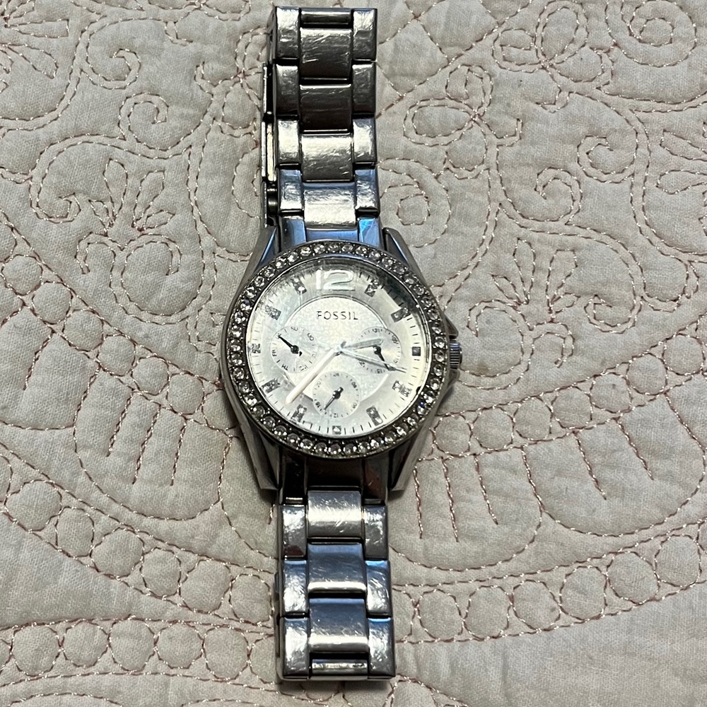 Women’s silver Fossil watch